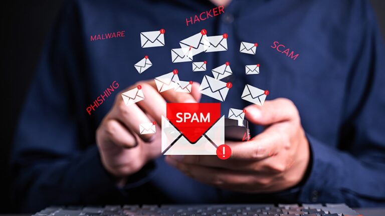 Person receiving spam messages on phone with warning icons for phishing, malware, and scam — uMobix parental control concept