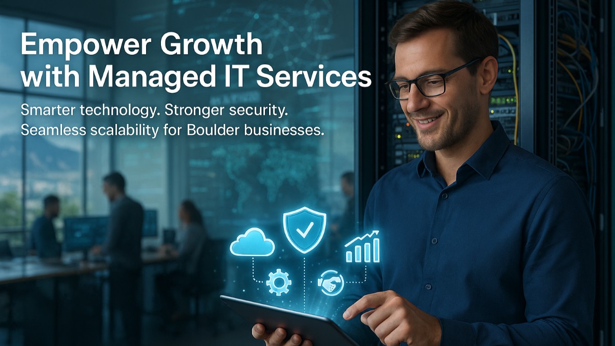 IT professional managing cloud systems and cybersecurity in a modern tech office representing managed IT services for Boulder businesses